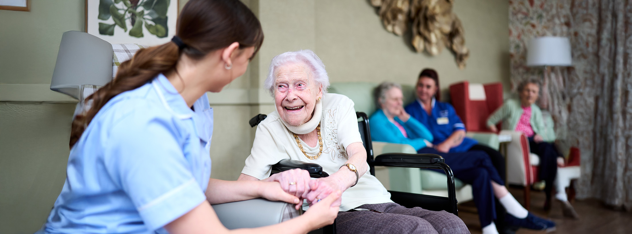 happy residents with staff - Northgate Healthcare